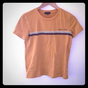 Yellow “feeling fine” graphic shirt